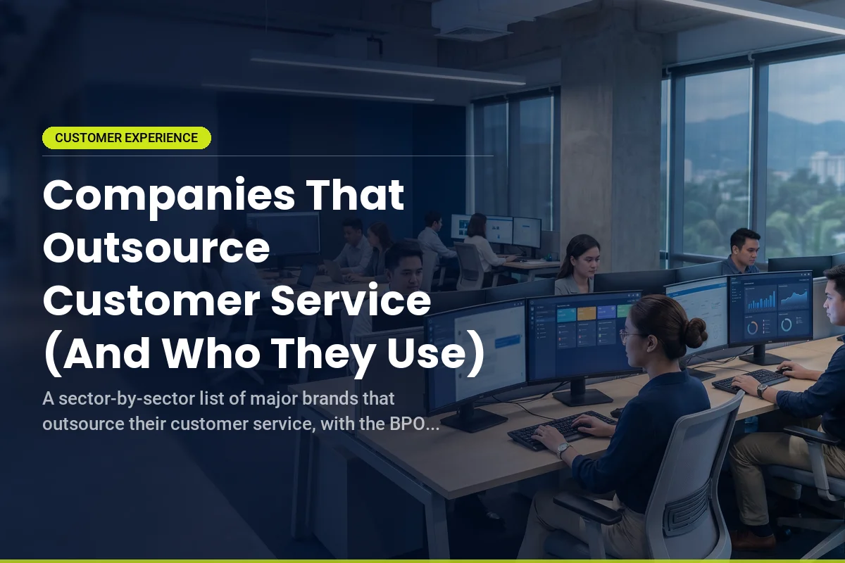 Office with multiple employees working at computer stations; large windows reveal an urban landscape outside. Text overlay discusses companies that outsource customer service.