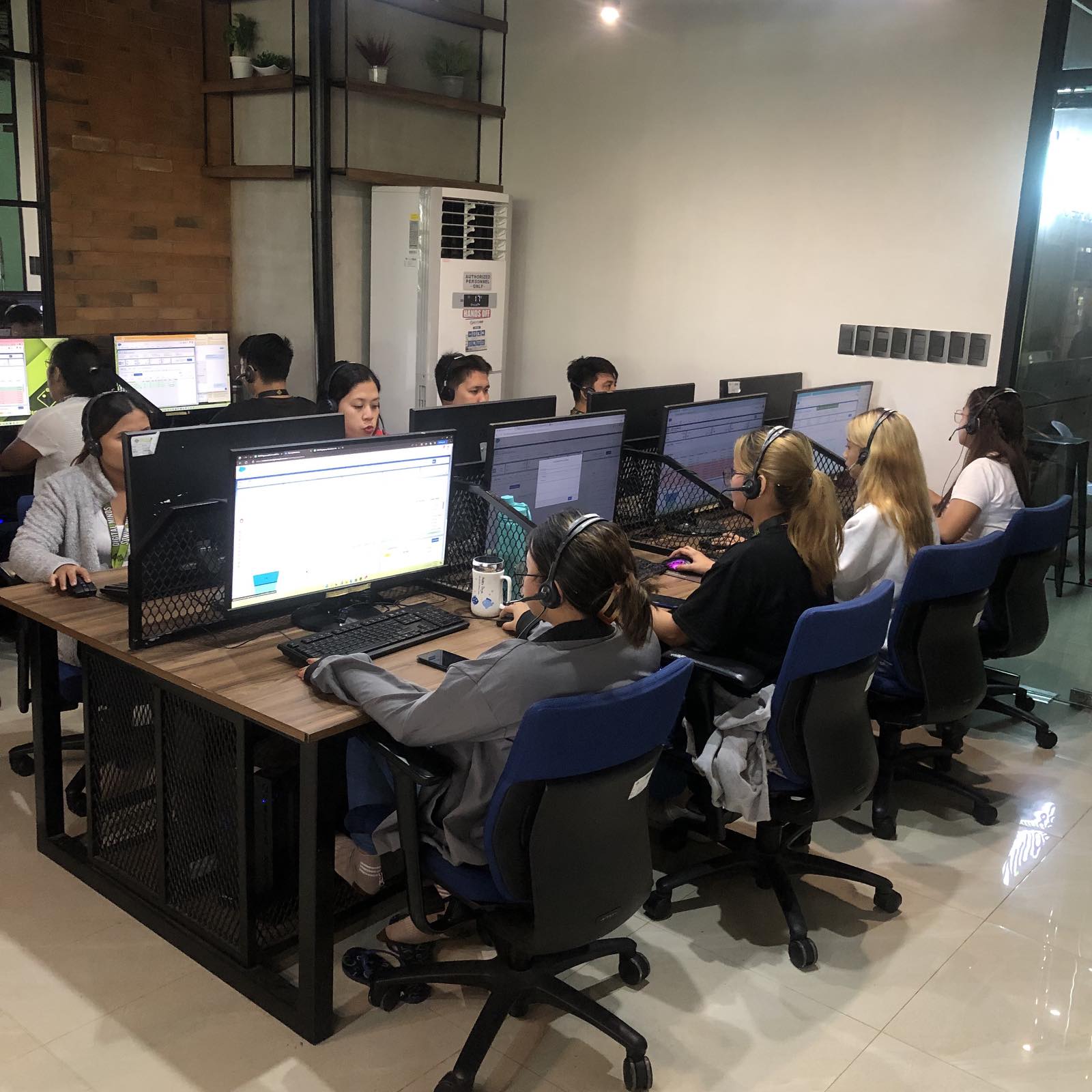 Digital Minds BPO team working at their Naga City office