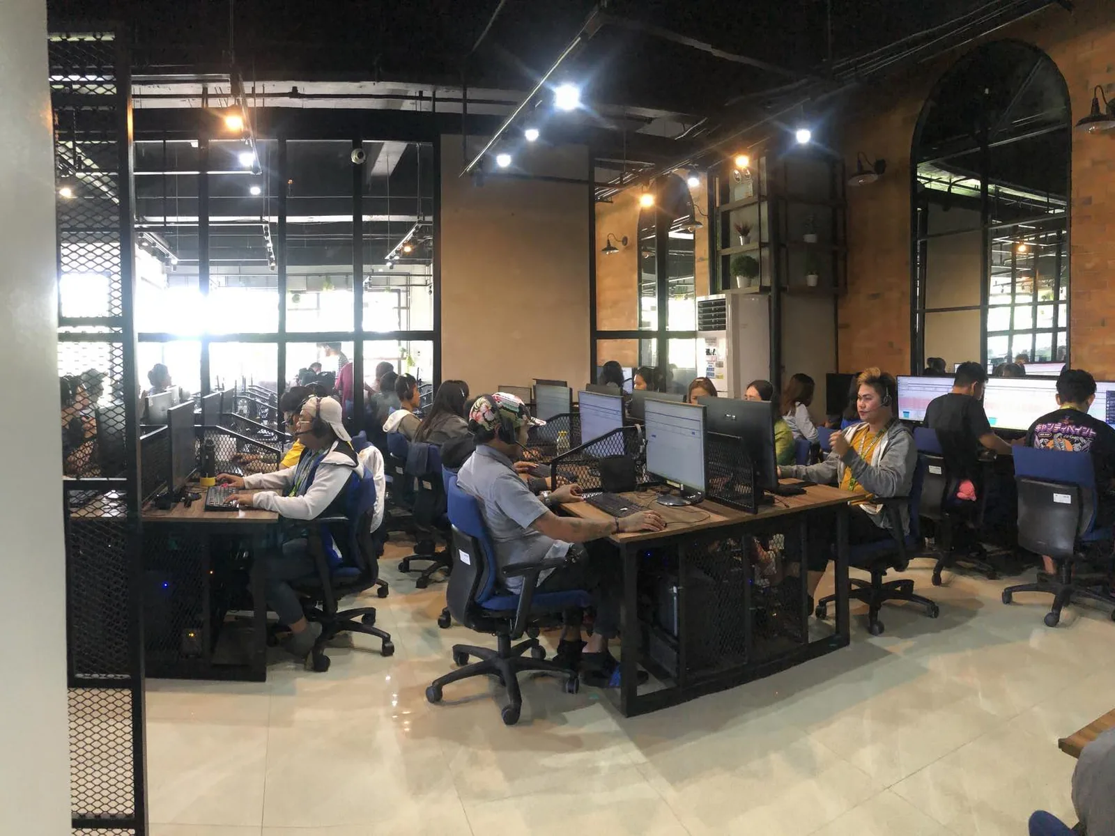 Customer service agents at work on the production floor of our J Miranda Avenue office in Naga City