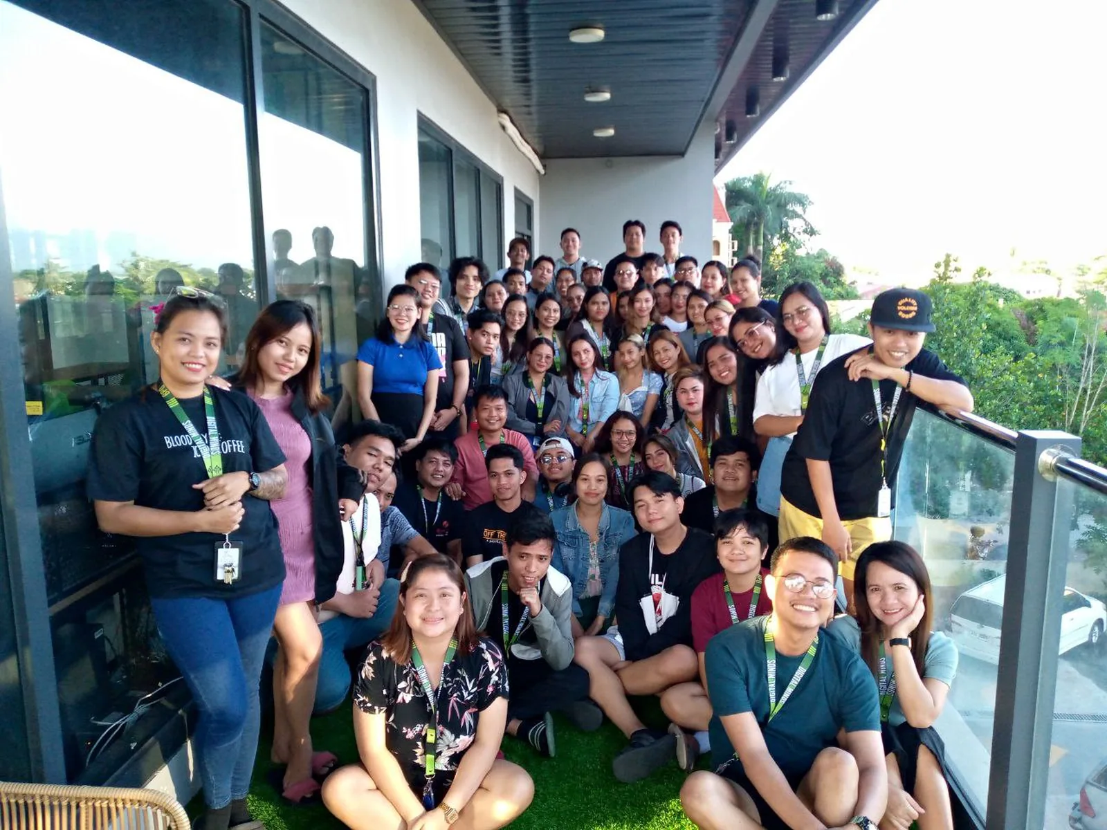 The Digital Minds BPO team on the office balcony in Naga City